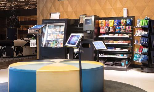 a store with a display of products in a store at Scandic Paasi in Helsinki