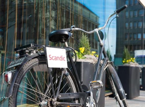 a bicycle with a sign on the side of it at Scandic Paasi in Helsinki