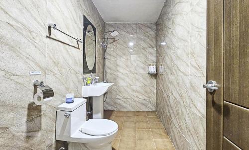a bathroom with a toilet and a sink at Nobotel Cheonan in Cheonan