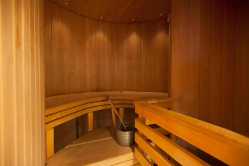 a wooden sauna with a potted plant in it at Scandic Patria in Lappeenranta