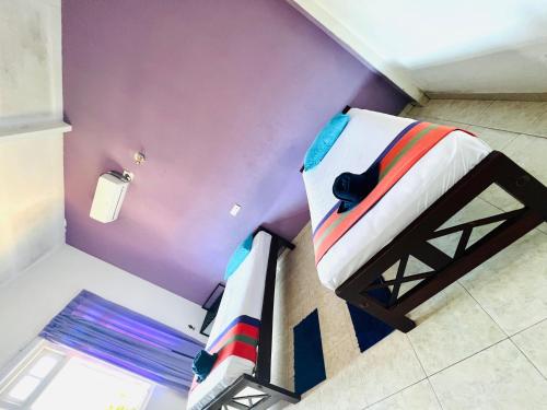 an overhead view of a bunk bed in a room at New Blue Mount View Kandy in Kandy