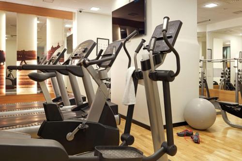a row of treadmills in a gym at Scandic Grand Central in Stockholm