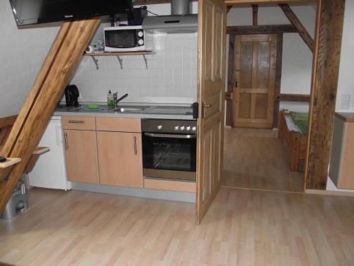 Η κουζίνα ή μικρή κουζίνα στο Ferienhaus Schneiders