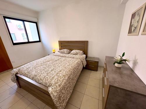 Postel nebo postele na pokoji v ubytování Mackenzie apartment 301