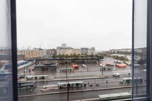 a view of a city from a window at Scandic Hakaniemi in Helsinki