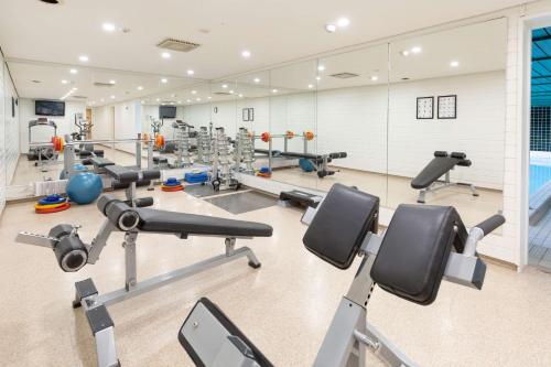 a gym with several treadmills and cardio machines at Scandic Rauma in Rauma