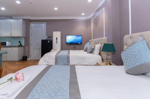 Η κουζίνα ή μικρή κουζίνα στο Hotel Apartment Royal Galaxy