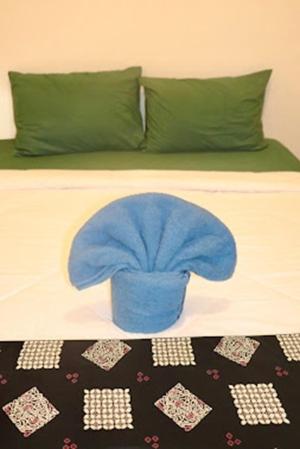 Katil atau katil-katil dalam bilik di Ijen & Sleep Homestay