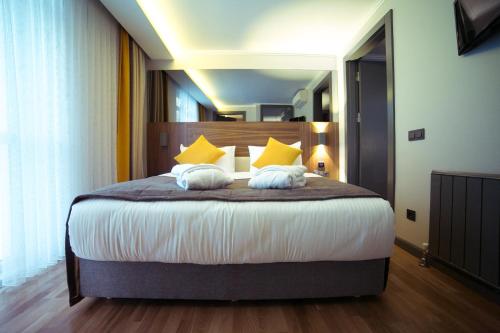 Una cama o camas en una habitación de Ankacity Suit Flat