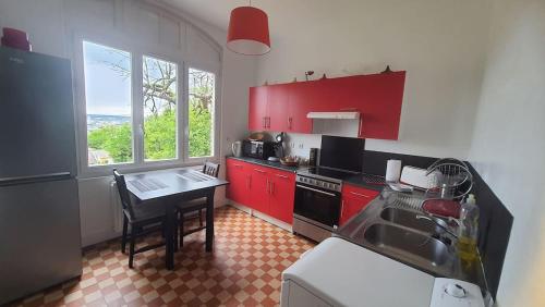 House with garden and view of Rouen