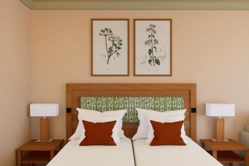 Postel nebo postele na pokoji v ubytování IFA Graal-Müritz Hotel & Spa