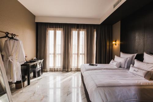 Katil atau katil-katil dalam bilik di SU29 Boutique Hotel