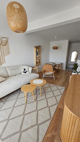 a living room with a couch and a table at Monte View Apartments in Ulcinj