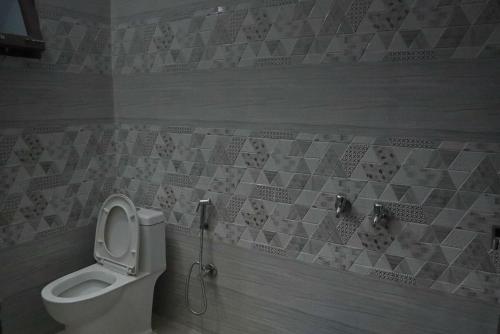 Ένα μπάνιο στο Sanguda Homestay