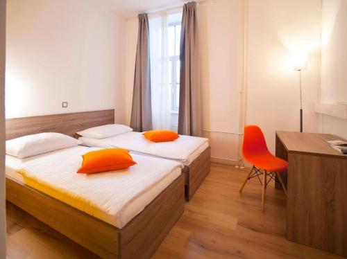 Postel nebo postele na pokoji v ubytování B&B HOTEL Maribor UNI Hostel