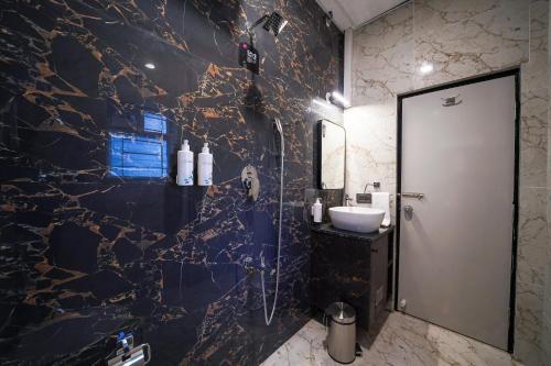 Ένα μπάνιο στο Olive Zip Sanjay Nagar by Embassy Group