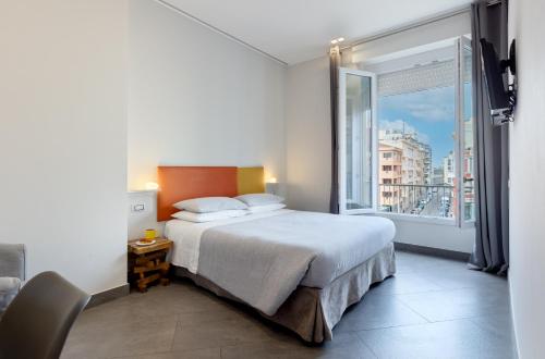 Postel nebo postele na pokoji v ubytování Centro storico via Sassari Accommodation