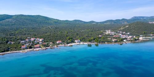 an aerial view of a small island in the water at Mediterranean Seaside Apartments - Deak in Drače