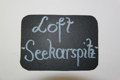a sign with the wordsoat september written on it at Ledermaier Loft & Lodge`s eU in Achenkirch