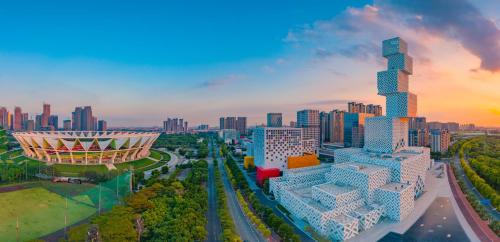 an aerial view of a city with a tall building at Foshan Marriott Hotel in Foshan