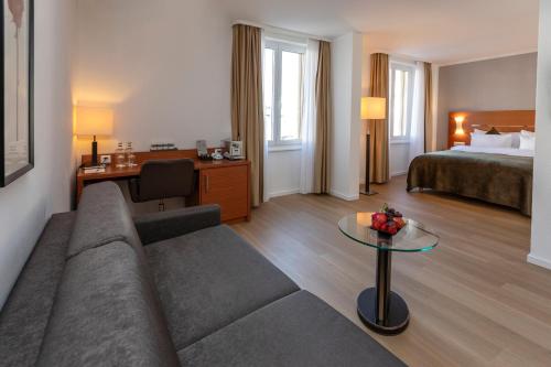 Katil atau katil-katil dalam bilik di Hotel la Palma au Lac