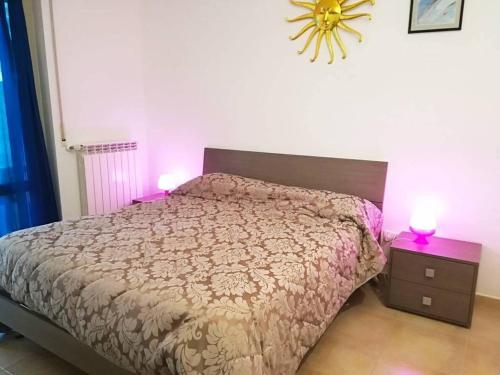 Postel nebo postele na pokoji v ubytování Casa Iris in Otranto