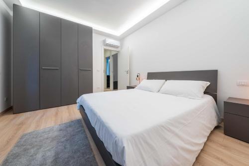 Кровать или кровати в номере La Casa del Bersagliere - APARTMENT