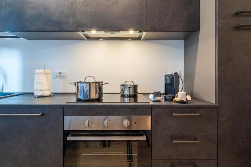 Кухня или мини-кухня в La Casa del Bersagliere - APARTMENT
