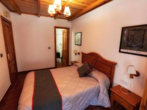 Katil atau katil-katil dalam bilik di Hotel Las Palmeras by Vivere Stays