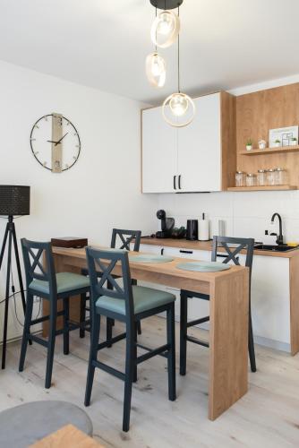 Dapur atau dapur kecil di Apartman Grozd