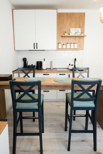 Dapur atau dapur kecil di Apartman Grozd