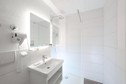 Koupelna v ubytování Ströbinger Hof - Therme Wellness Resort