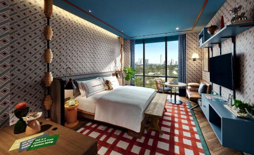 Una cama o camas en una habitación de 25hours Hotel Jakarta The Oddbird