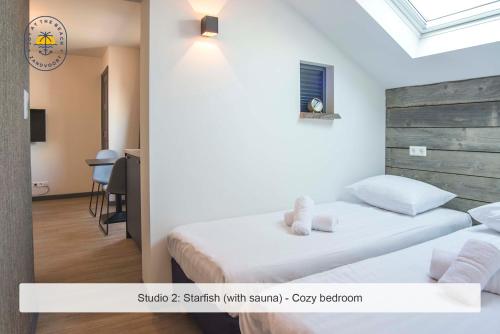 Ένα ή περισσότερα κρεβάτια σε δωμάτιο στο Joy at the Beach