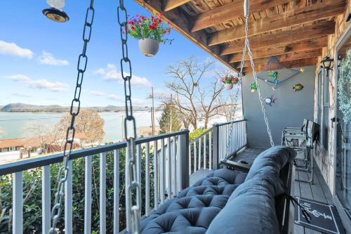 a balcony with a view of the water at Beautiful Lakeview Chateau with Stunning Views home in Rutledge