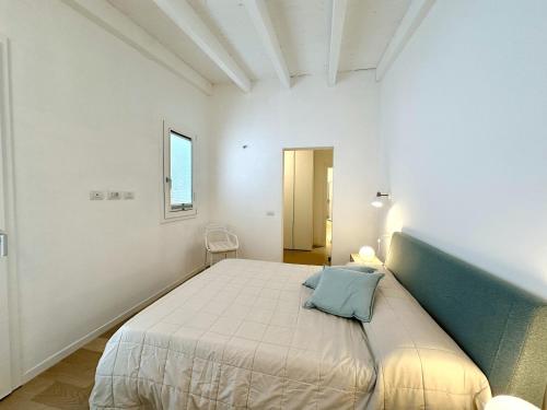 Ένα ή περισσότερα κρεβάτια σε δωμάτιο στο Casa Le Vittorie