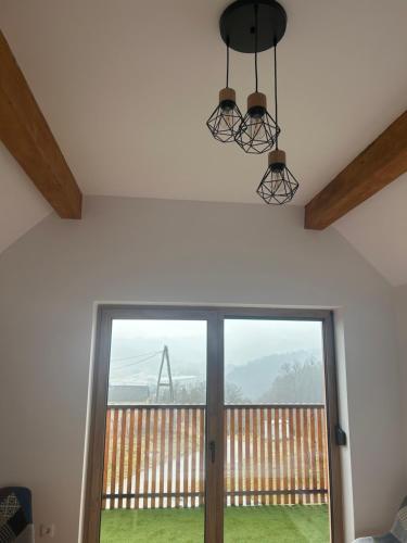 a room with a sliding glass door with a view at Ana Apartment in Gradišča