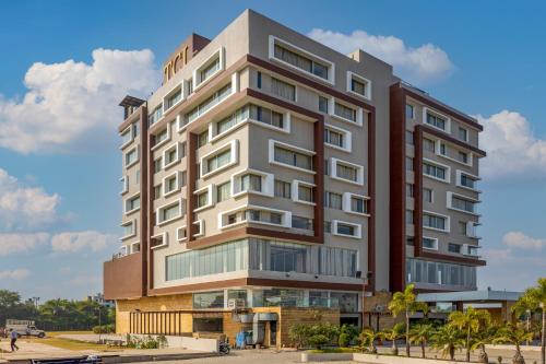 a rendering of a hotel building at The Chandra Leela Hotel in Indore