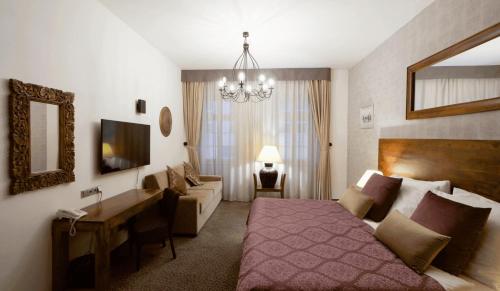 Postel nebo postele na pokoji v ubytování Hotel Residence Agnes