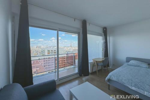 En eller flere senge i et værelse på Flexliving - room - Saint Amand