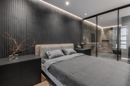 Кровать или кровати в номере AVALON on Lypynskogo street (New building)