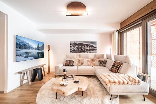พื้นที่นั่งเล่นของ Apartment Chamoisine, Châtel - by EMERALD STAY