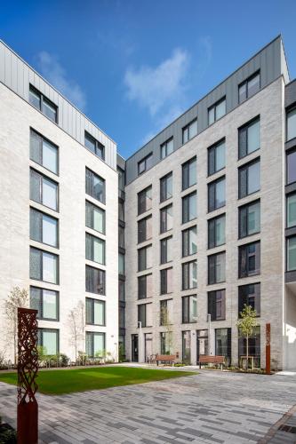 an image of two buildings with a courtyard at Luxury Studio Apartments in Cork City Centre in Cork