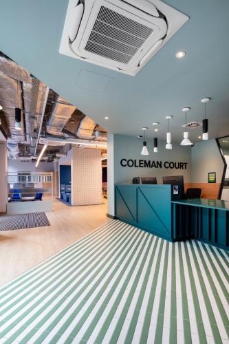 an office lobby with a coliseum court sign on the ceiling at Luxury Studio Apartments in Cork City Centre in Cork