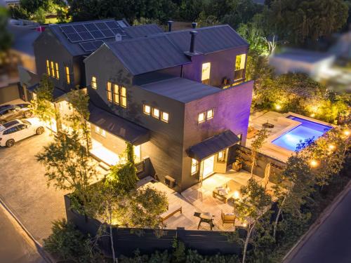 an aerial view of a house with a swimming pool at The Royal Junction in Riebeek-Kasteel