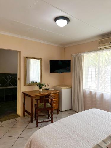 Μια τηλεόραση ή/και κέντρο ψυχαγωγίας στο Guesthouse 52