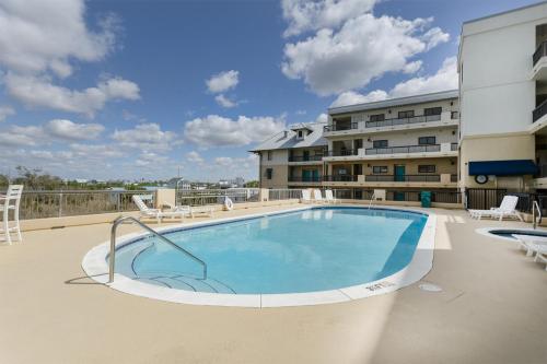 a swimming pool on the roof of a apartment building at Beach Paradise - Perfect Ocean Sunset Views with Pool & Sauna & Breakfast! in Mexico Beach