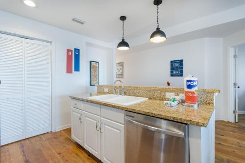 a kitchen with a sink and a dishwasher at Beach Paradise - Perfect Ocean Sunset Views with Pool & Sauna & Breakfast! in Mexico Beach