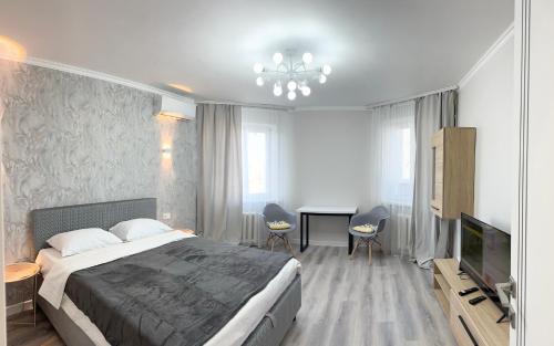 Llit o llits en una habitació de Main boulevard two bedrooms