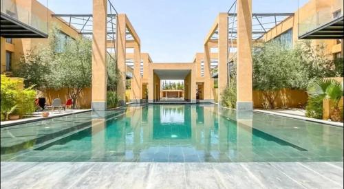 Bazén v ubytování Cozy appartement Marrakech nebo v jeho okolí